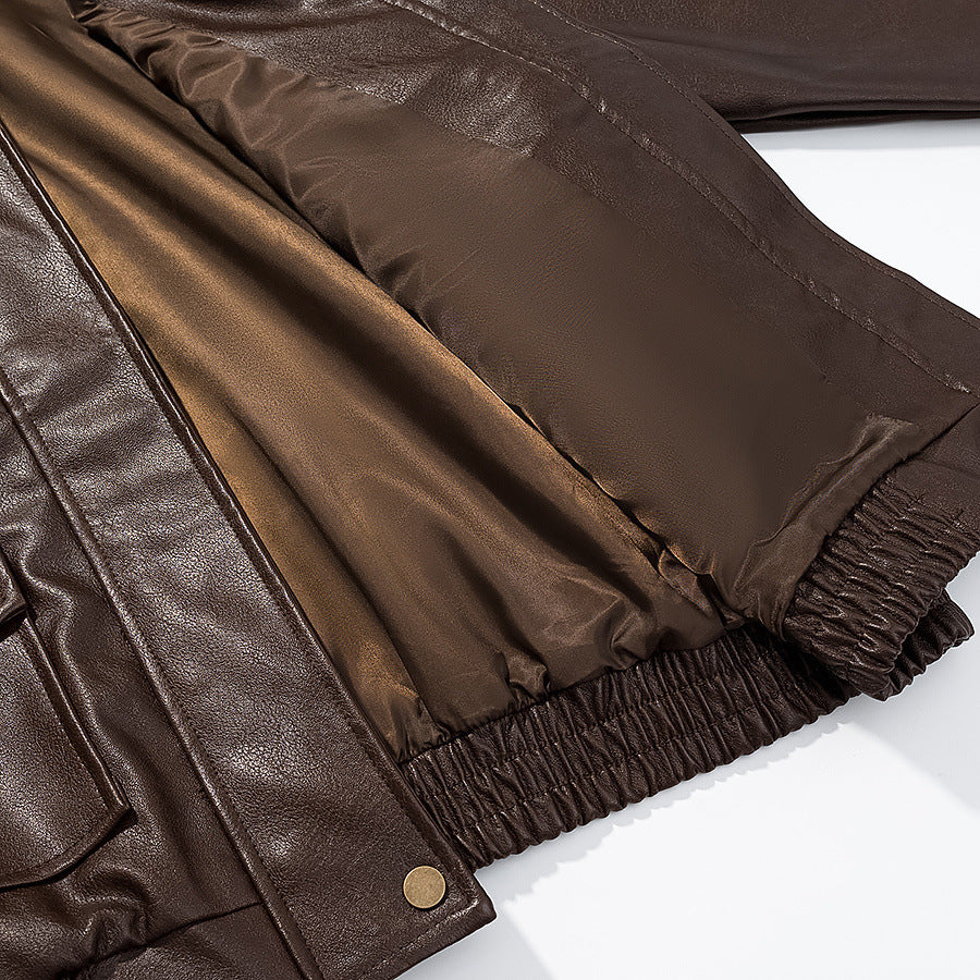 Women's casual faux leather bomber jacket with shirt collar, patch pockets, and elastic hem Mune Fashion