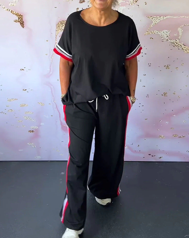 Ladies' sporty-elegant two-piece set with boxy short sleeve shirt, drawstring jog pants, and side contrast stripe Mune Fashion