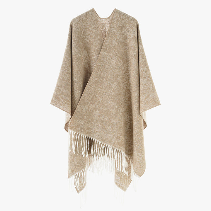 Women's poncho made of wool blend knit with fringes and wide oversized cut Mune Fashion