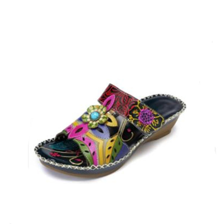 Ladies wedge slide with floral decor and handcrafted leather applications Mune Fashion