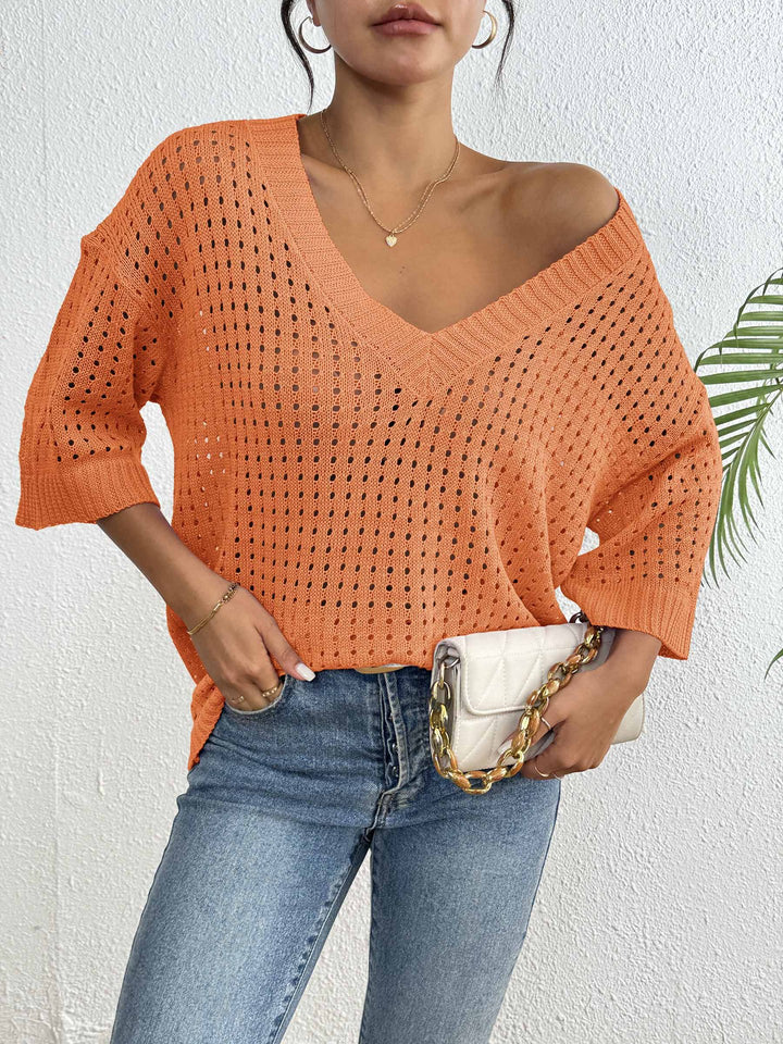 Ladies lightweight knit sweater with V-neck and decorative hole pattern Mune Fashion