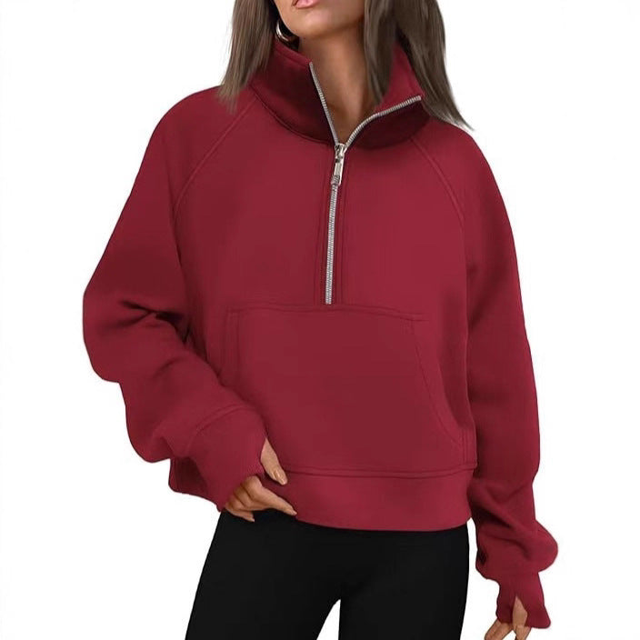 Women’s oversized half-zip sweater with kangaroo pocket, thumb holes, and high collar Mune Fashion
