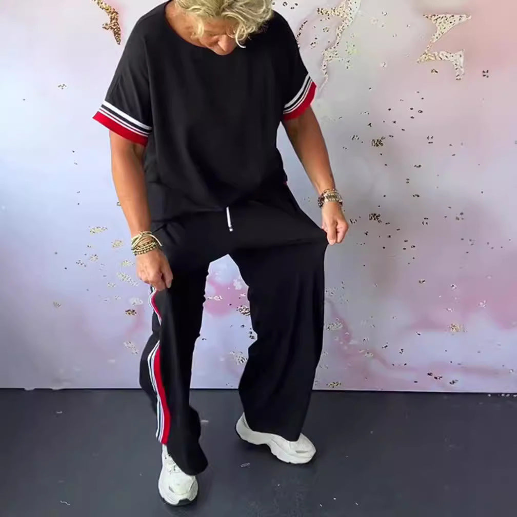 Ladies' sporty-elegant two-piece set with boxy short sleeve shirt, drawstring jog pants, and side contrast stripe Mune Fashion