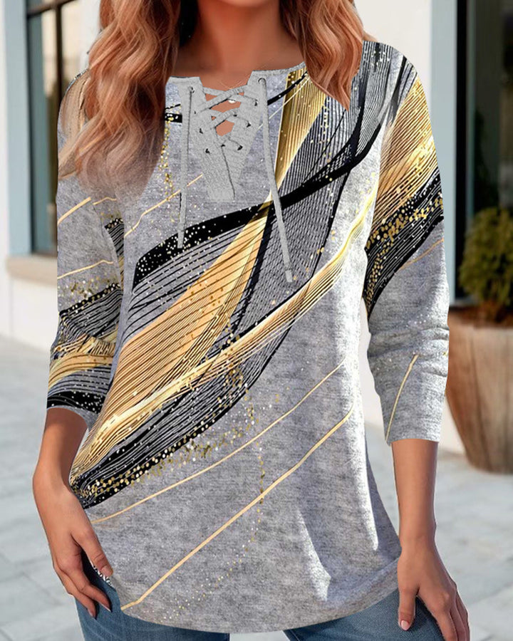 Women's long shirt with lace-up collar, three-quarter sleeves, and graphic metallic print Mune Fashion