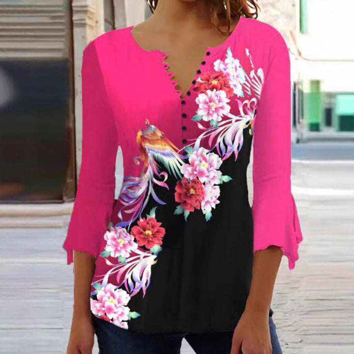 Women's V-neck tunic blouse with floral bird pattern, three-quarter flounce sleeves and figure-flattering hem Mune Fashion
