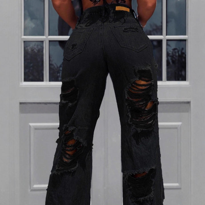 Ladies high-waisted destroyed jeans with wide legs and large knee rips Mune Fashion