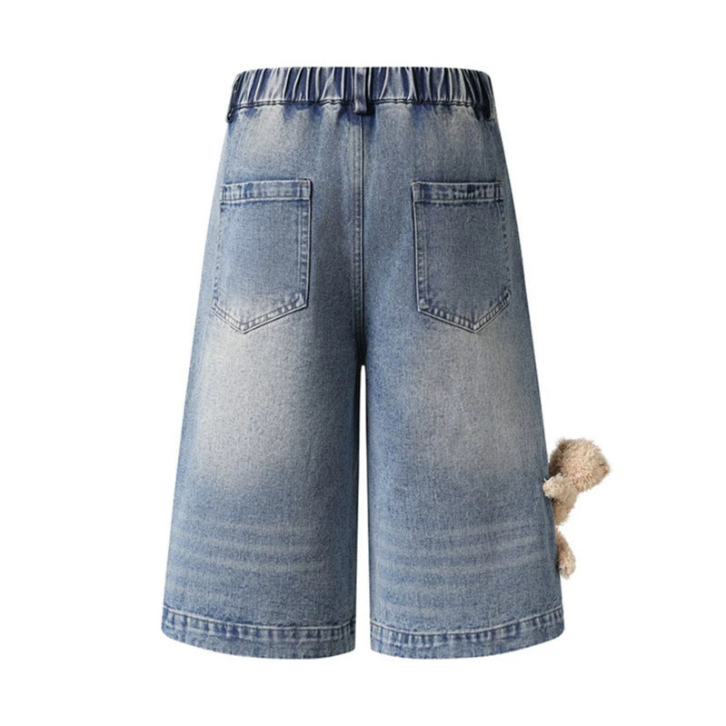 Women's playful denim culotte shorts with a high comfort waistband, allover doodle print & teddy pendant Mune Fashion
