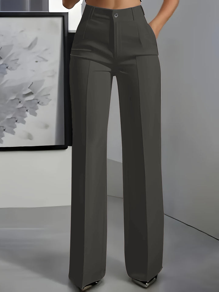 Women's high-waisted pleated trousers with wide leg and crease detail