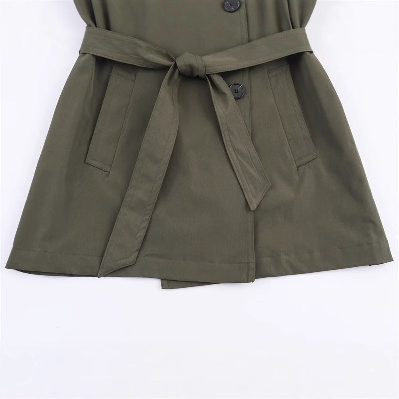 Women's short trench coat with A-line silhouette, double-breasted button placket, detachable belt, and shoulder epaulettes Mune Fashion