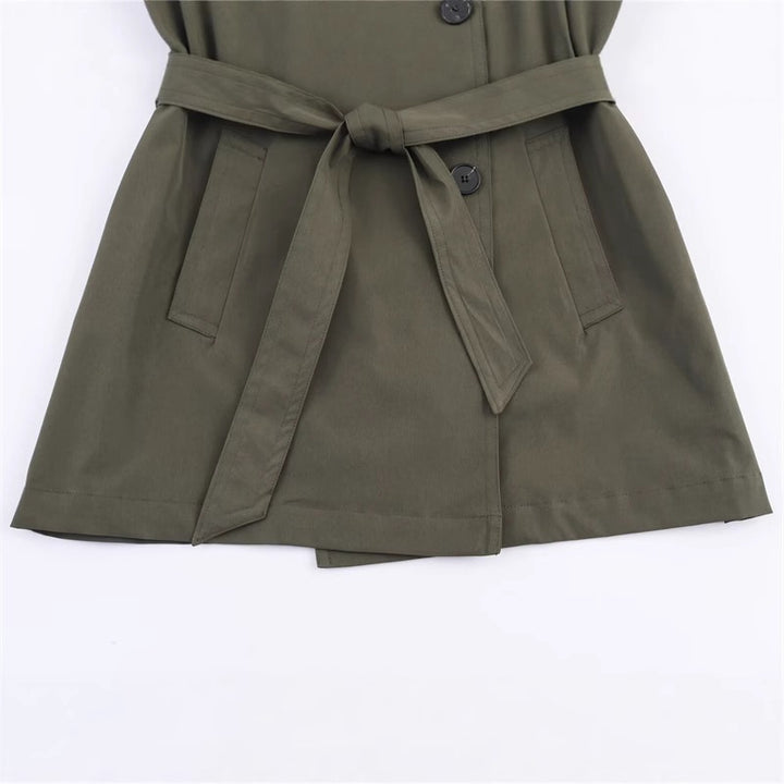 Women's short trench coat with A-line silhouette, double-breasted button placket, detachable belt, and shoulder epaulettes Mune Fashion