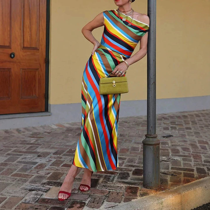 Women's asymmetrical off-shoulder maxi dress with diagonal stripe pattern and fitted silhouette Mune Fashion