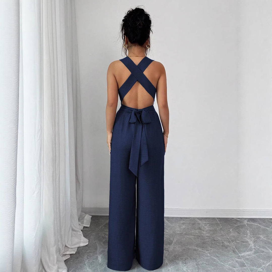 Women’s jumpsuit with wide leg, tailored wrap belt and eyelet straps Mune Fashion