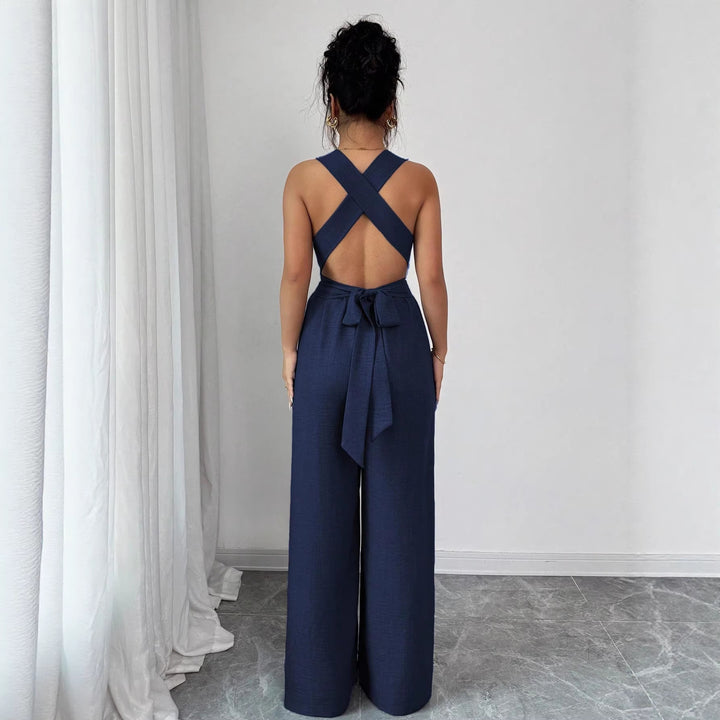 Women’s jumpsuit with wide leg, tailored wrap belt and eyelet straps Mune Fashion