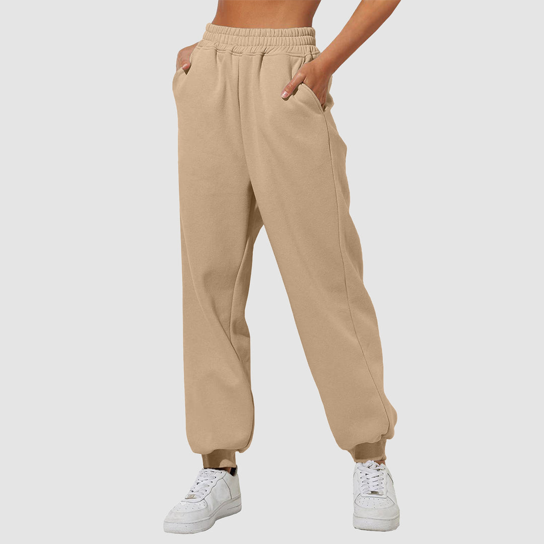 Women's wide High-Waist jogging pants with soft creases, elastic comfort waistband, and ribbed ankle cuffs Mune Fashion