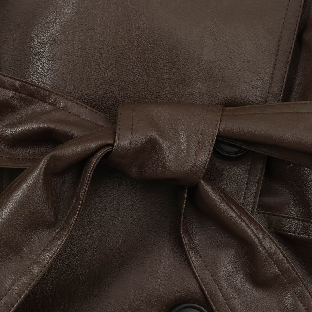 Women's short jacket in leather look with tie belt and asymmetrical button placket Mune Fashion