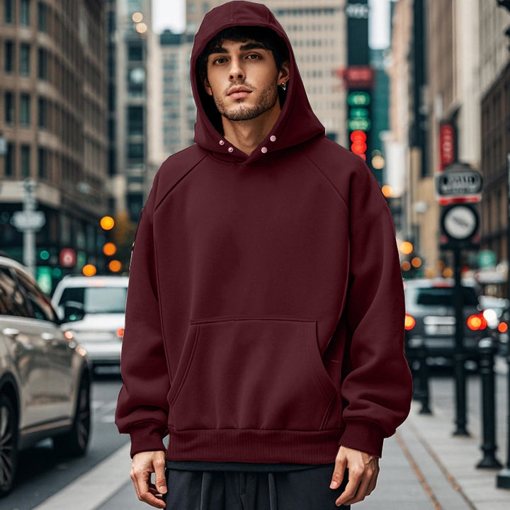 Men's oversized hoodie with kangaroo pocket, raglan sleeves, and ribbed cuffs Mune Fashion