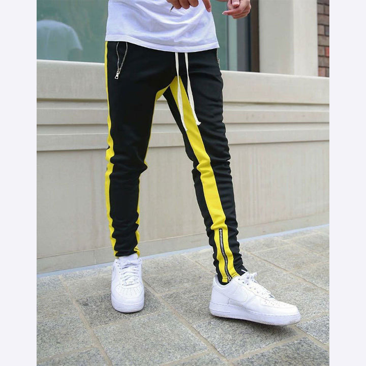 Men's narrow jogging pants with side contrast stripe, drawstring and ankle zipper Mune Fashion