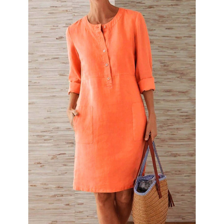 Women loose-fitting linen-look dress with three-quarter sleeves, button placket and side pockets Mune Fashion