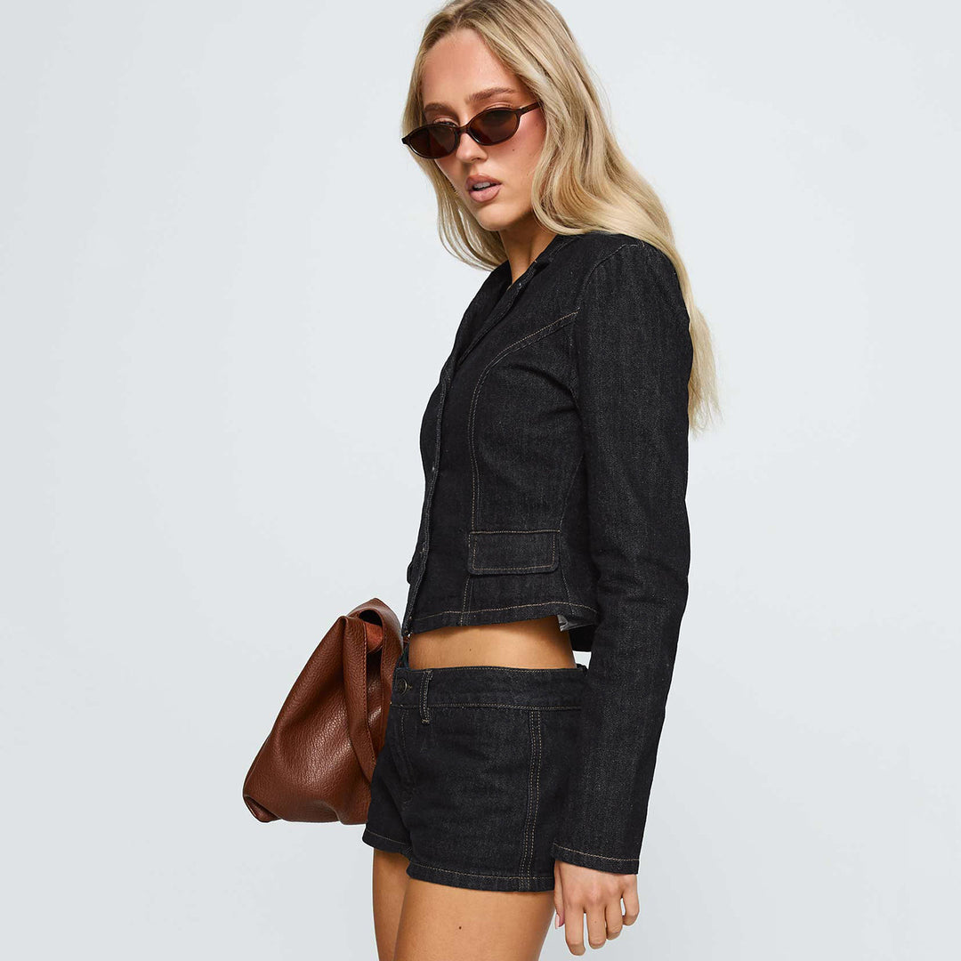Women Short Blazer fitted with decorative seams and flap pockets Mune Fashion