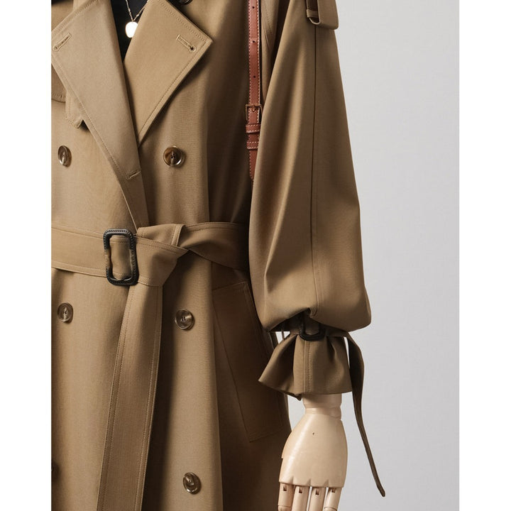 Women's trench coat with balloon sleeves, double-breasted cut and waist belt Mune Fashion