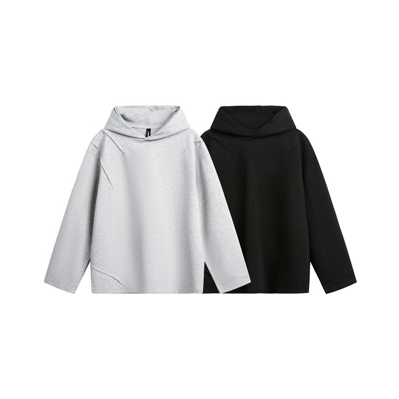 Unisex Oversize Hoodie made of lightweight French Terry with distinctive darts.