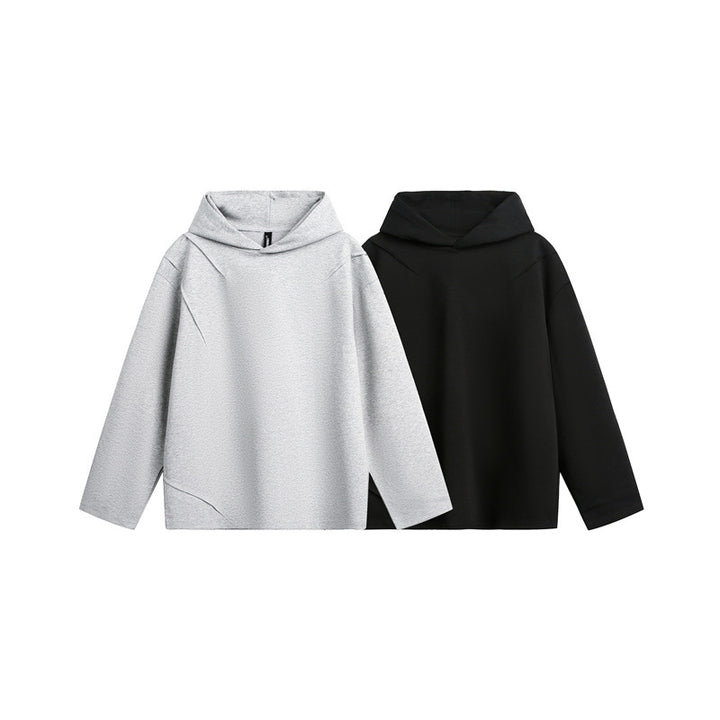Unisex Oversize Hoodie made of lightweight French Terry with distinctive darts.