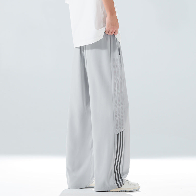 Men's sporty leisure pants with side ventilation openings