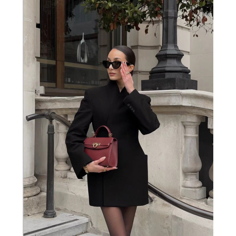 Women's tailored blazer dress coat with stand collar, distinctive shoulder shape, and patch pockets Mune Fashion