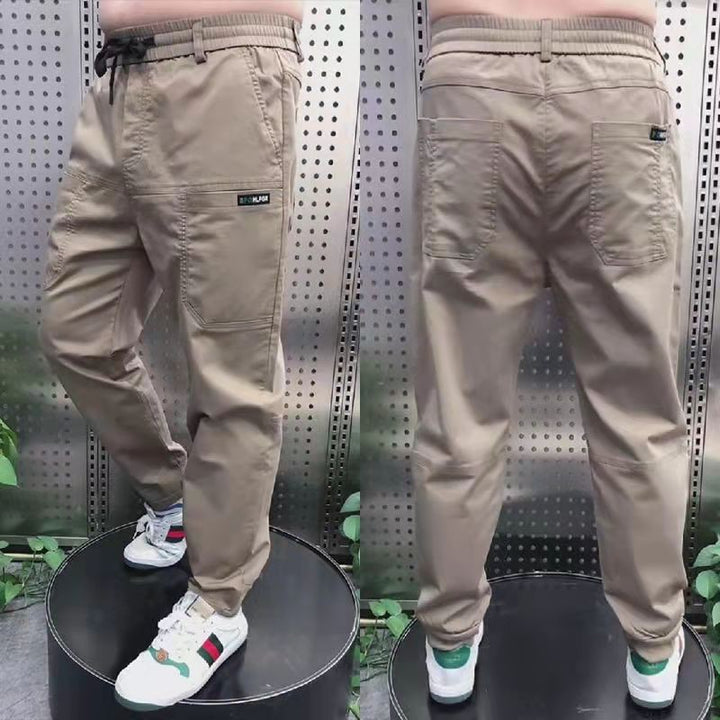 Men's sporty cargo jogger pants with elastic waistband, drawstring, and tapered leg hem Mune Fashion