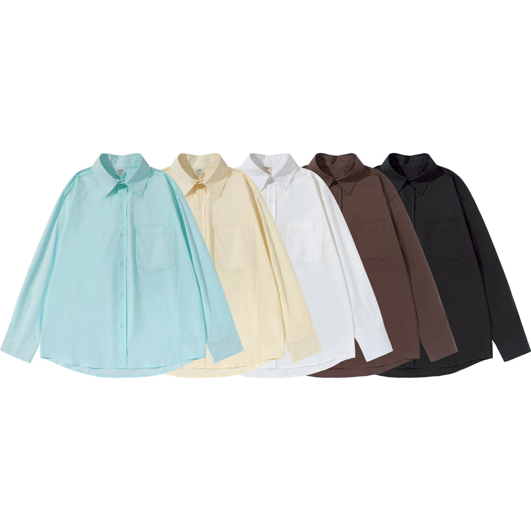 Unisex Boxy shirt with Kent collar, applied breast pocket and relaxed fit Mune Fashion