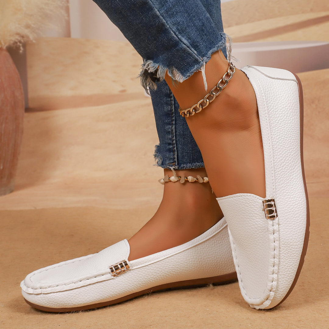 Women's slim moccasin slippers with hand-stitched front seam, padded comfort footbed, and flexible non-slip rubber sole Mune Fashion
