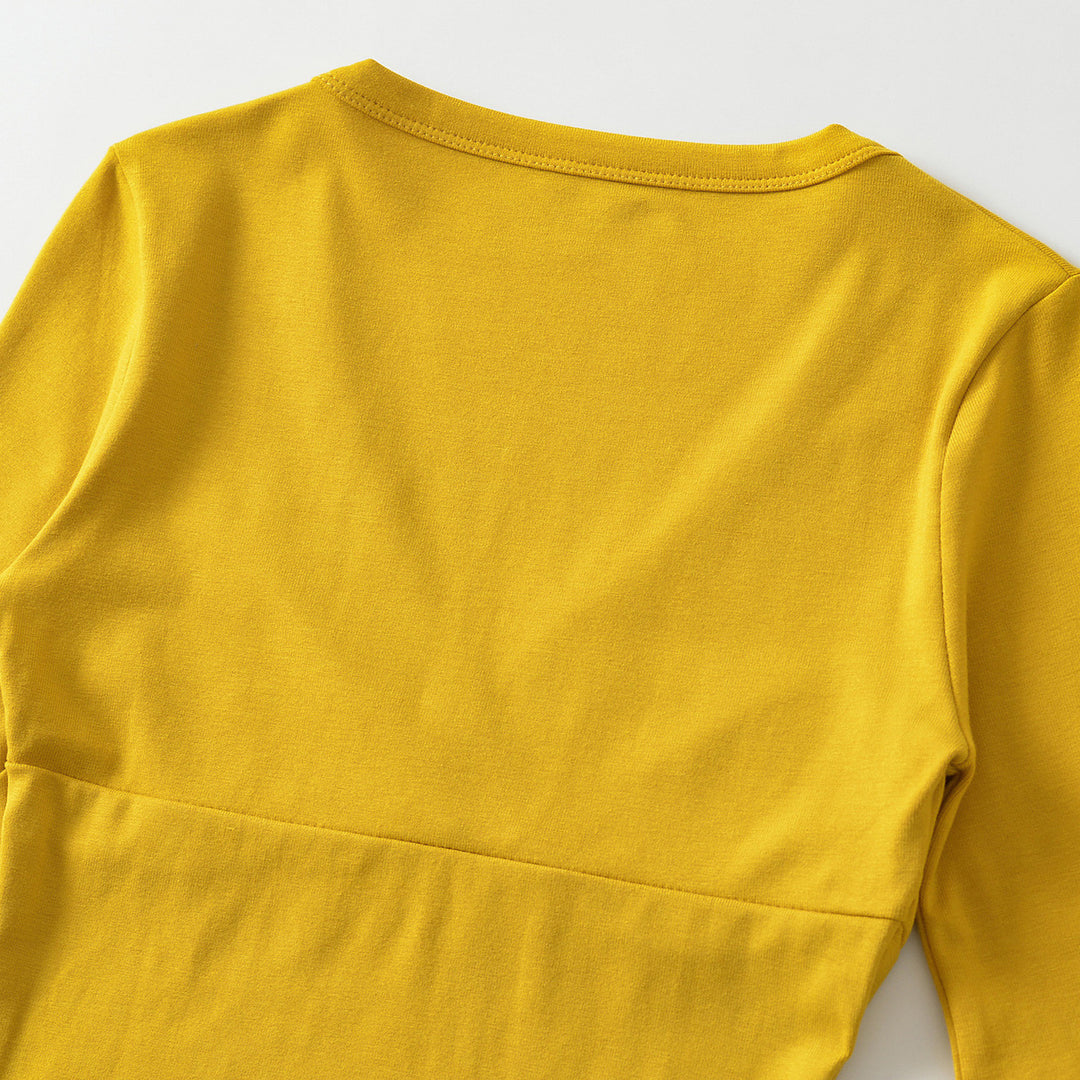 Women's body-hugging wrap shirt with deep V-neck, three-quarter sleeves, and waist accentuation Mune Fashion