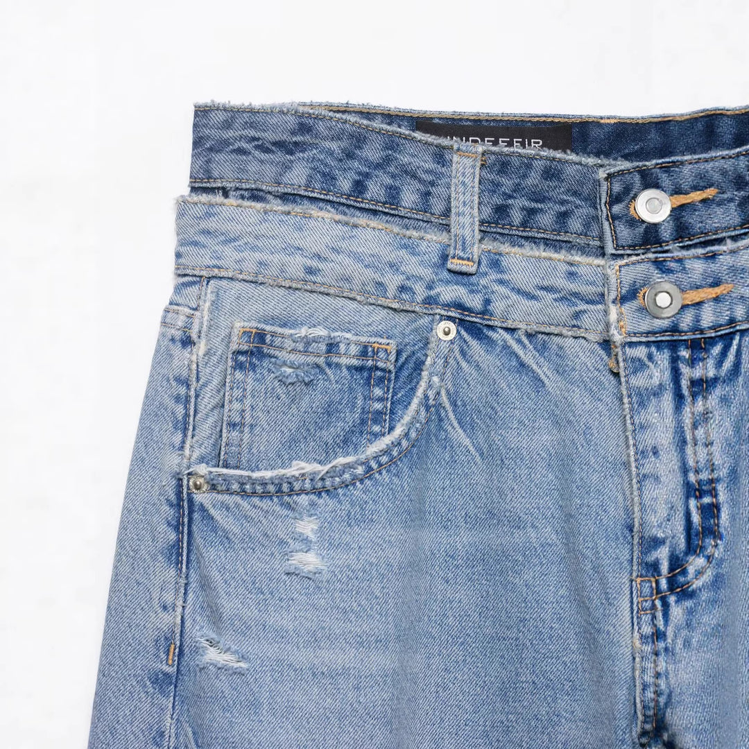 Ladies wide waist high jeans with washed finish and rips Mune Fashion