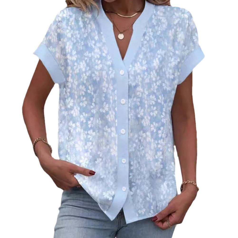 Women's airy button blouse with V-neck, rolled sleeves and floral textured print Mune Fashion