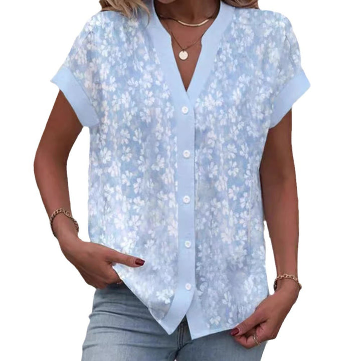 Women's airy button blouse with V-neck, rolled sleeves and floral textured print Mune Fashion