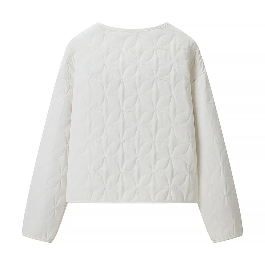 Women's quilted boxy transitional jacket with floral quilted texture, lightly padded inner lining and press stud placket Mune Fashion