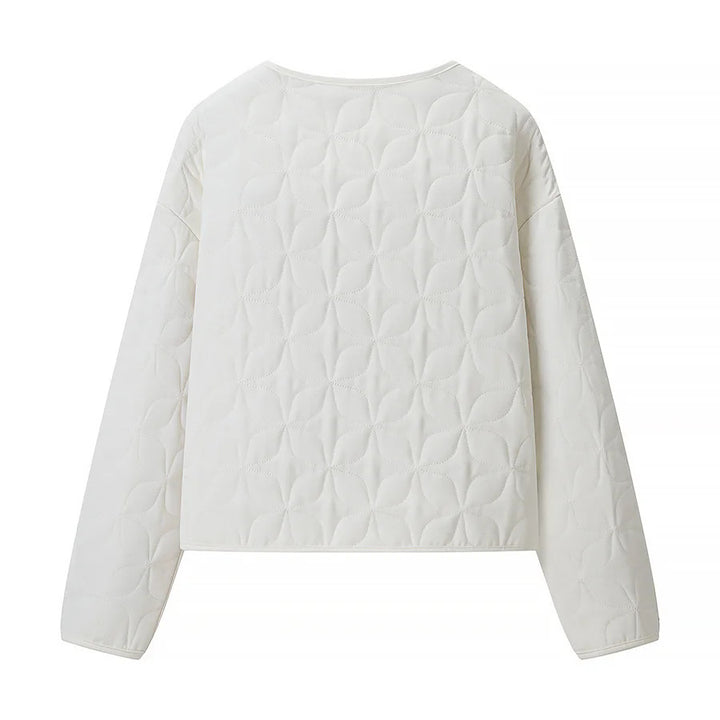 Women's quilted boxy transitional jacket with floral quilted texture, lightly padded inner lining and press stud placket Mune Fashion