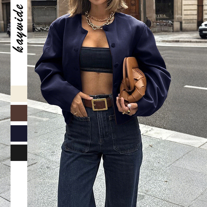 Women's oversized wool jacket with snap button placket, boxy silhouette, and patch pockets Mune Fashion