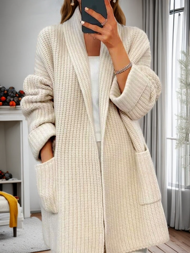 Women's longer oversized knitted coat with shawl collar and patch pockets Mune Fashion