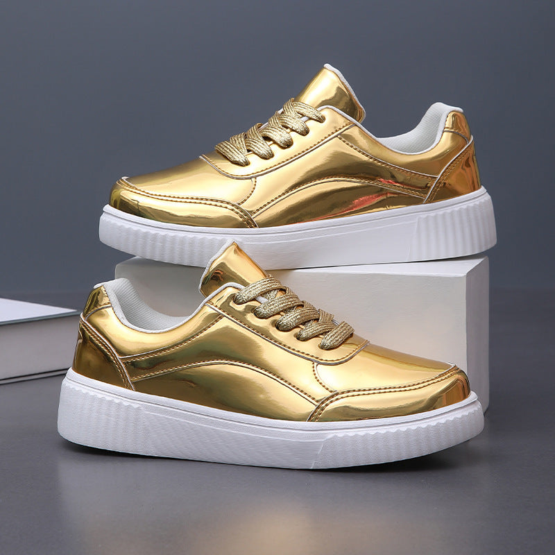 Ladies' low-cut sneakers with reflective patent upper, padded shaft, and raised outsole with groove profile Mune Fashion