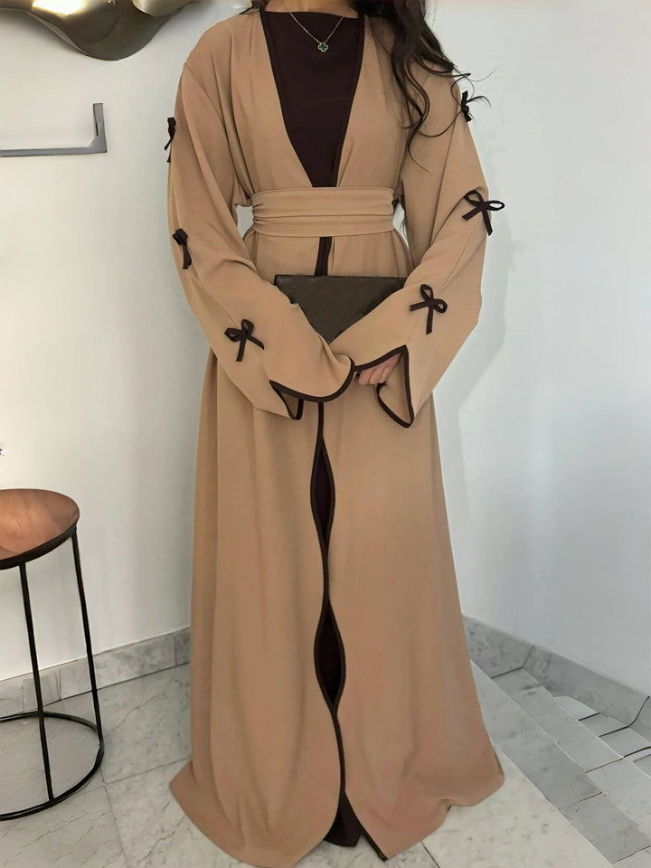 Women's elegant Abaya-Kaftan with wide trumpet sleeves, contrasting yoke and wrap belt Mune Fashion