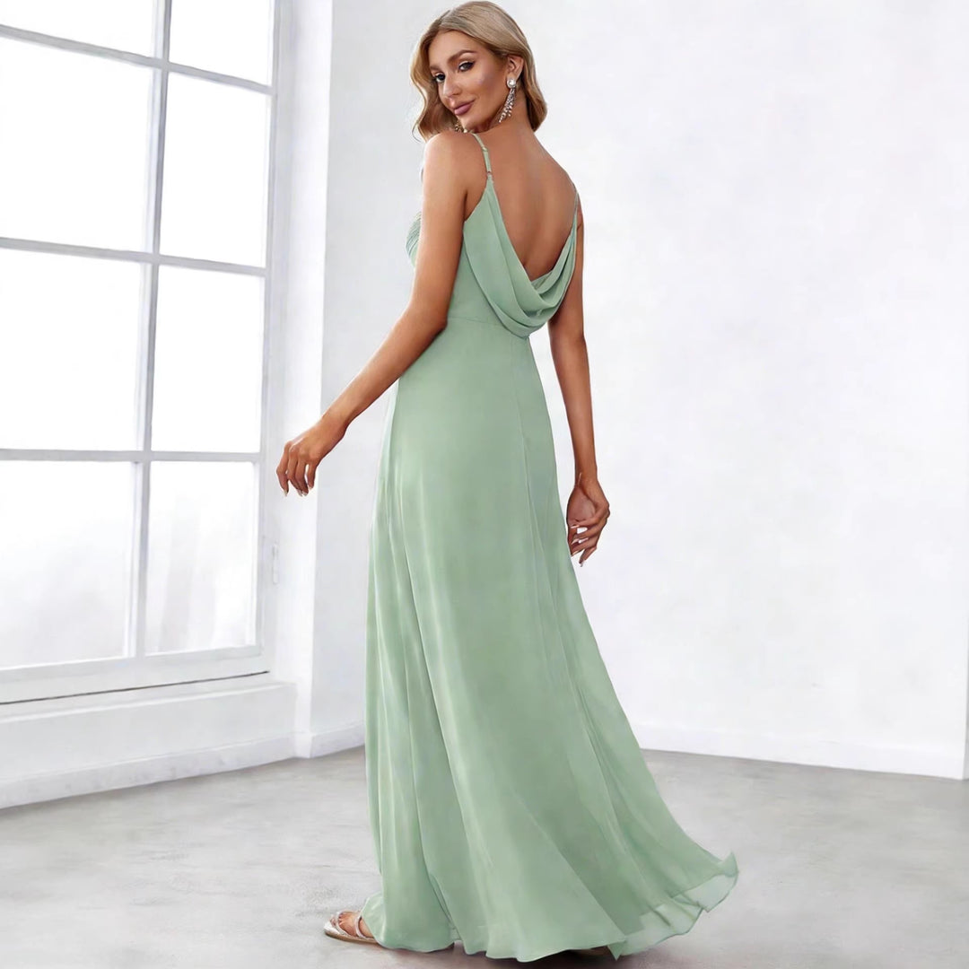 Ladies flowing chiffon evening dress with crossed draping, empire waist and fine spaghetti straps Mune Fashion