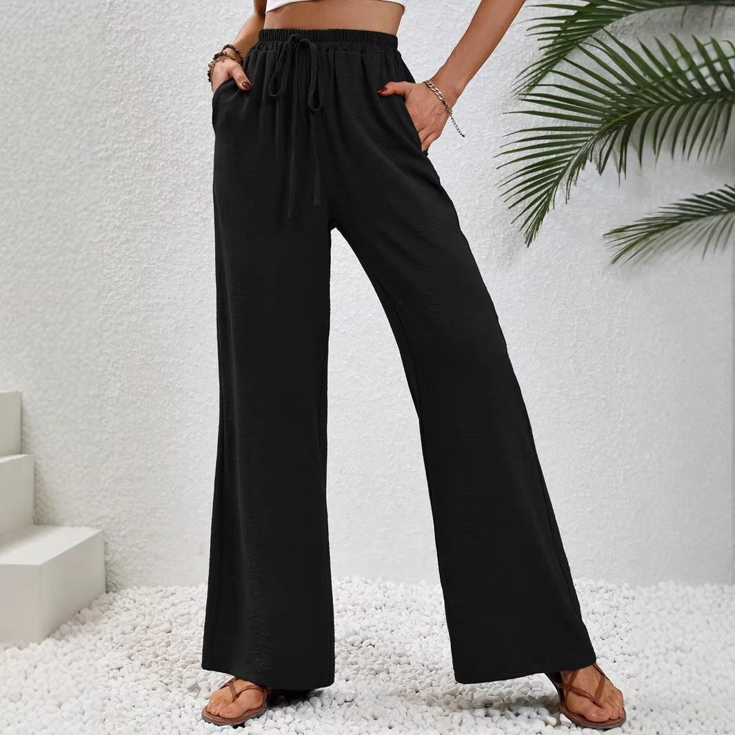 Ladies lightweight, loose-fitting beach pants with elastic waistband, drawstring and side pockets Mune Fashion
