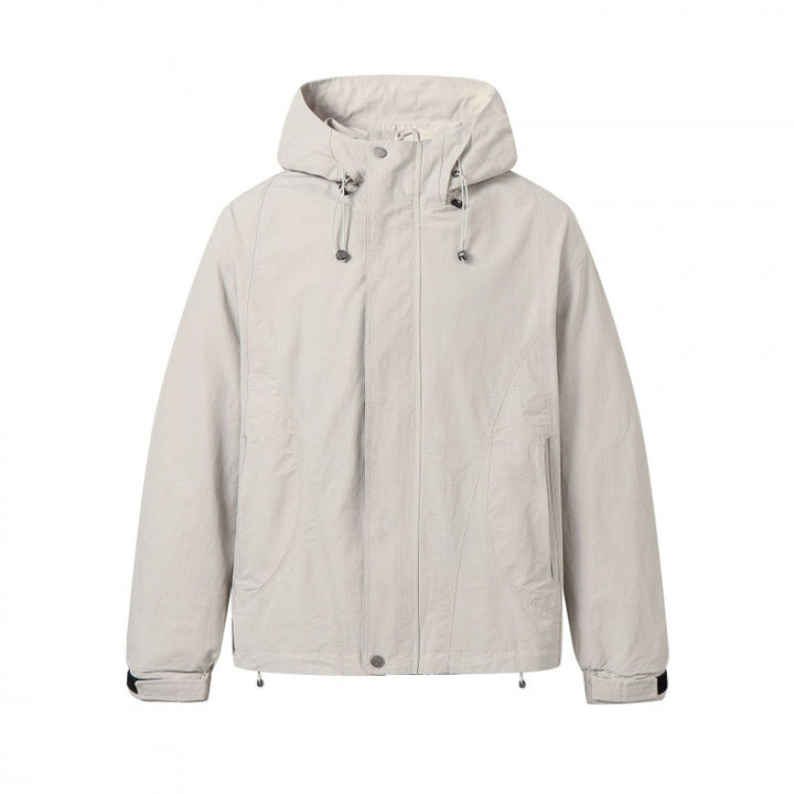 Unisex Short cut hoodie in technical outdoor style with drawstring, concealed front placket and adjustable cuffs Mune Fashion