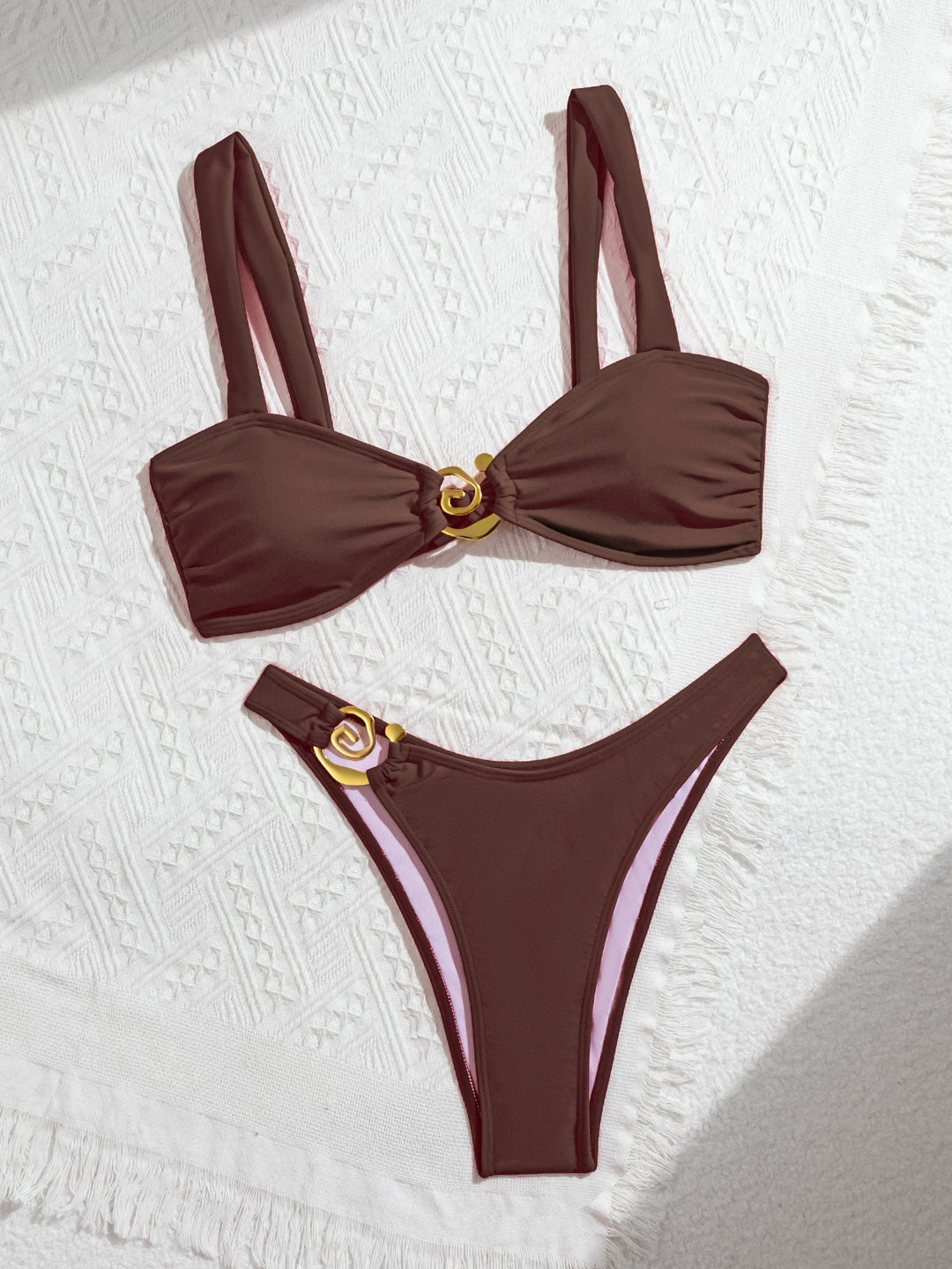 Women's elegantly cut bikini set with decorative metal elements Mune Fashion