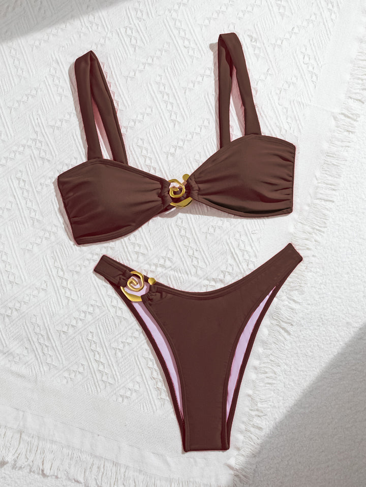 Women's elegantly cut bikini set with decorative metal elements Mune Fashion