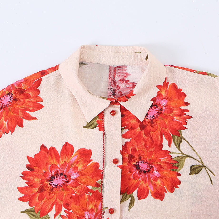 Women's oversized blouse with floral print, full button placket and three-quarter sleeves Mune Fashion