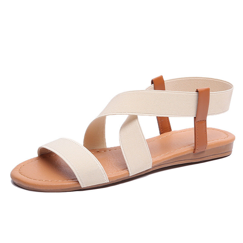 Women's flat elastic strap sandals with crossed stretch bands and padded comfort footbed Mune Fashion