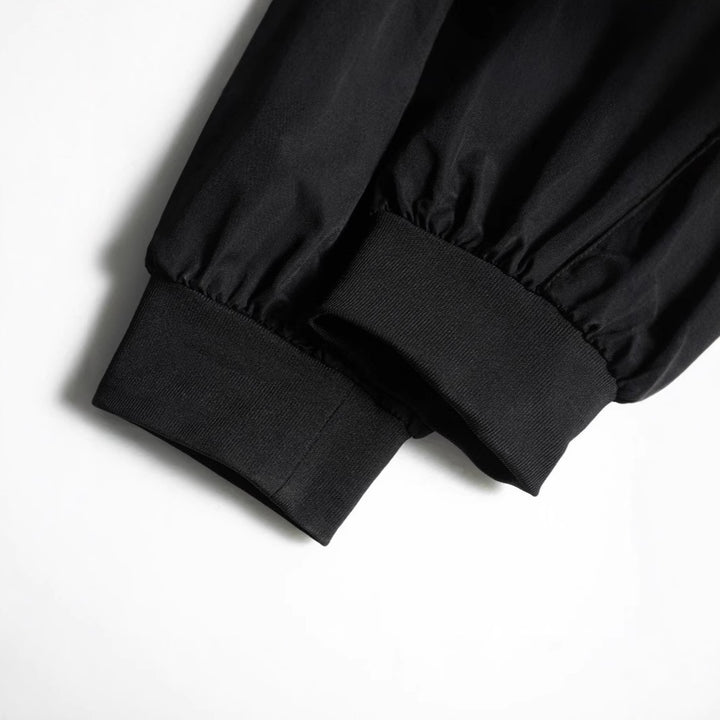Men's tapered utility cargo pants in jogger style with multiple pockets, drawstring & elastic ankle cuffs Mune Fashion