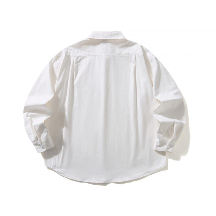 Unisex Oversized shirt with button-down collar, chest pocket and rounded hem Mune Fashion